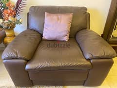 Leather sofa. Brown color. Single seater.