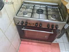 Gas stove in good condition with gas cylinder for sale