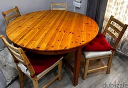 Expandable dining table with chairs for sale