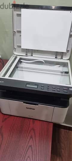 Used Brother DCP mono laser printer good condition available in Mangaf