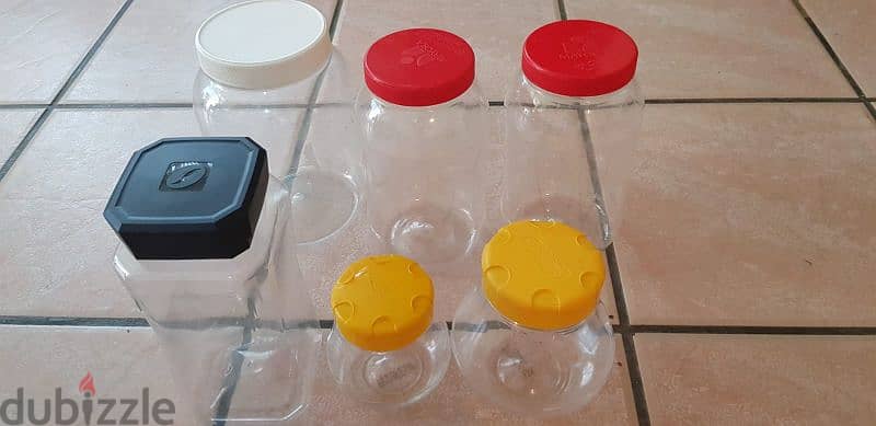 6 plastic Storage Jars 1