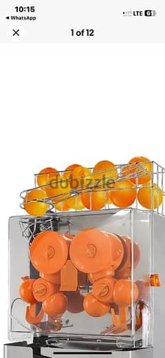 orange juice machine.  وفواكه ماكينة عصير برتقال