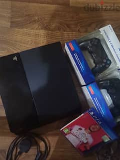 PS4 with 2 controllers and fifa 20 0