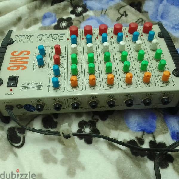 6 channel stereo mixer with vocal effect available . 6