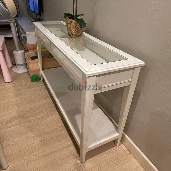 I m selling my IKEA LIATORP console Table. 1