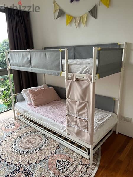 Moveable IKEA under bed frame with mattress. 2