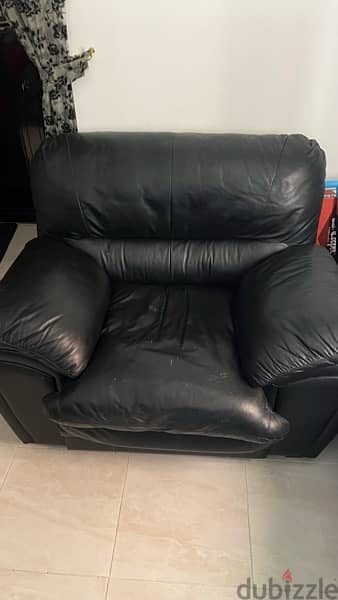 black leather sofa 1