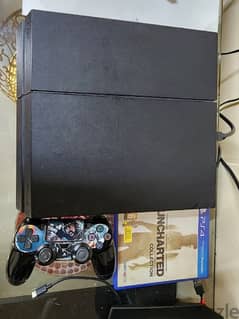 ps4 with controller and uncharted collection