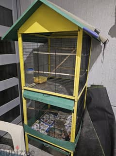 Sofa bed, cupboards, bed, and bird cage for sale