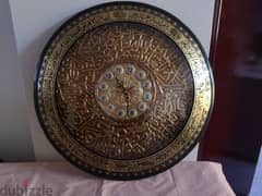 Wall clock with Islamic inscriptions