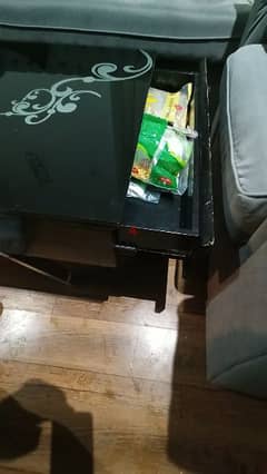 black glass table with 2 side drawers in good condition