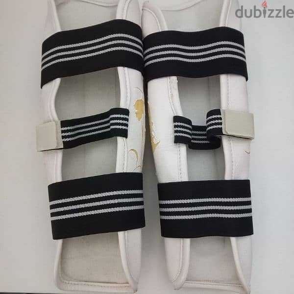 Taekwondo leg cover غطاء قدم للتايكواندو 1