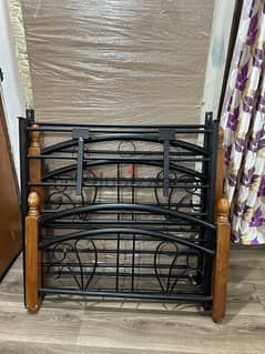 Single Iron Bed /  wooden legs