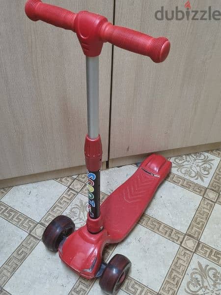 Red colour 2 wheel Scooter bike. 1