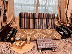 Small diwaniya 2 cushions 2 hand pillows 1 small table 0