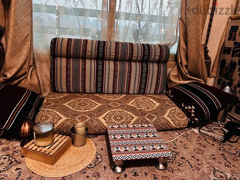 Small diwaniya 2 cushions 2 hand pillows 1 small table 1