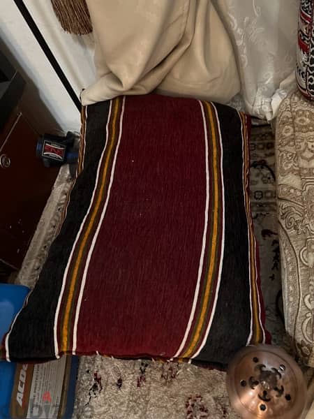 Small diwaniya 2 cushions 2 hand pillows 1 small table 2