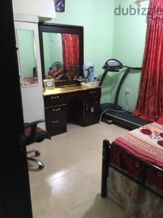 1  furnished room available for rent only for working lady in block1 0