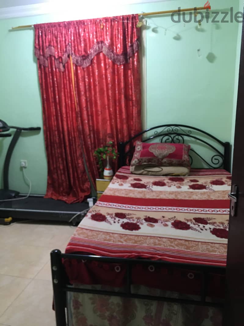 1  furnished room available for rent only for working lady in block1 2