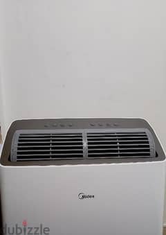 MIDEA PORTABLE AIR CONDITIONER