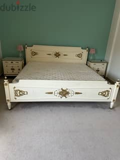 king size bed with two side table