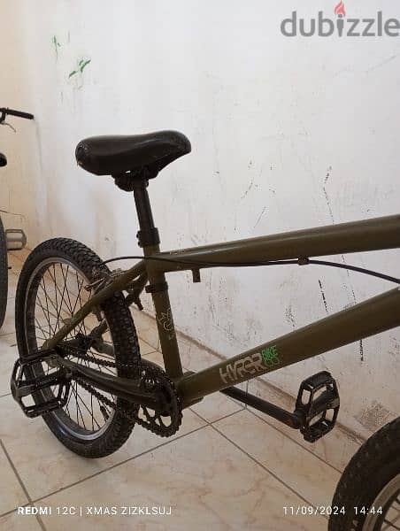 dark green and black BMX bike 2