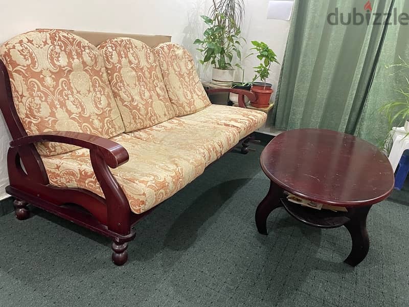 3 seater wooden sofa with centre table for immediate sale 1