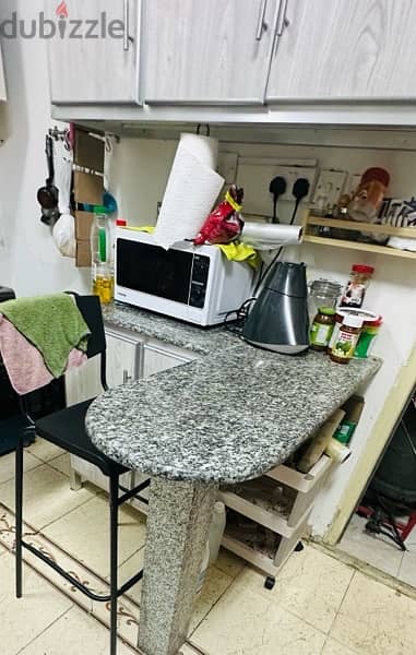 kitchen cabinets with plate rack and breakfast table 1