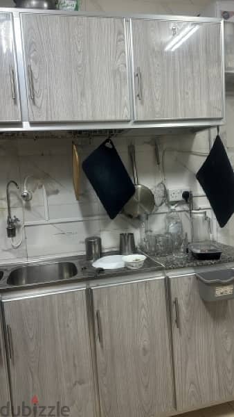 kitchen cabinets with plate rack and breakfast table 2