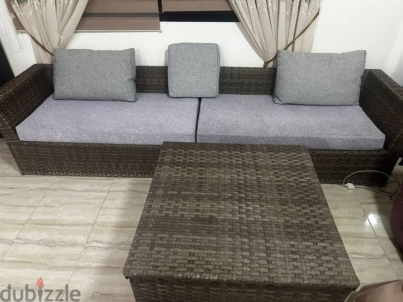 Outdoor/indoor sofa with storage table 0