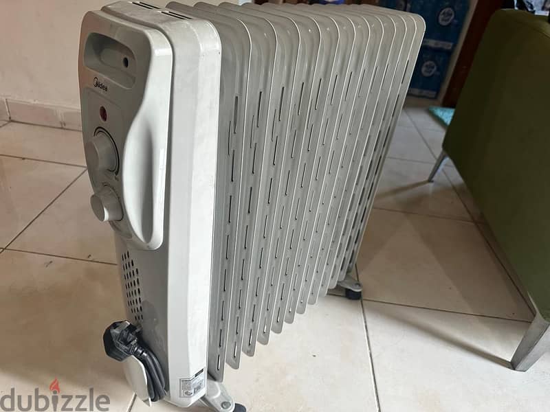 Oil heater+ electric heater 2 items 2