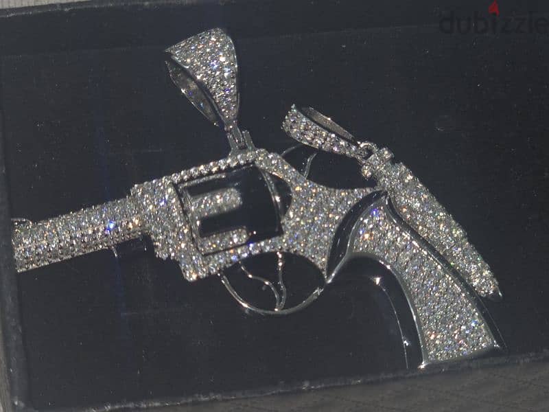 iced out revolver with chain and iced out bullet 2