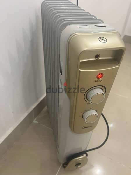 Midea oil heater (2000 watts ) New condition 3