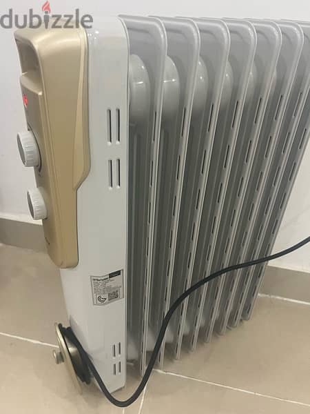 Midea oil heater (2000 watts ) New condition 4