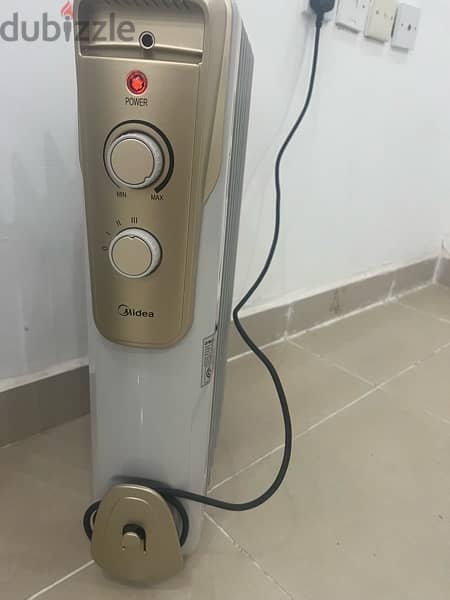 Midea oil heater (2000 watts ) New condition 6