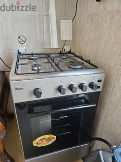 4 burner cooking range with a overhead for exhaust and gas cylinder 0