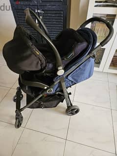 giggles stroller with child car seat for sale In good condition