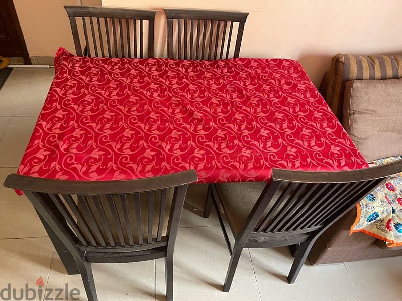 Dining table with 4 chairs in good condition for sale 0