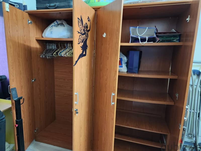 four door wooden cupboard 1