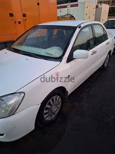 Mitsubishi Lancer 2004ميتسوبيشى لانسر 1