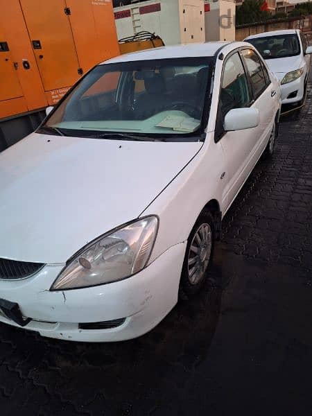 Mitsubishi Lancer 2004ميتسوبيشى لانسر 2