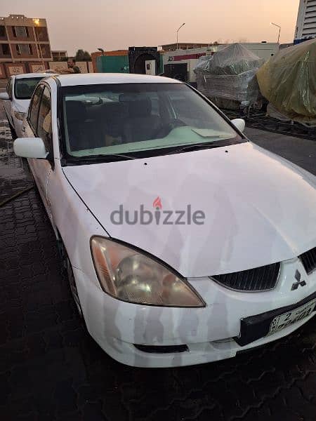 Mitsubishi Lancer 2004ميتسوبيشى لانسر 3