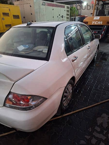 Mitsubishi Lancer 2004ميتسوبيشى لانسر 4