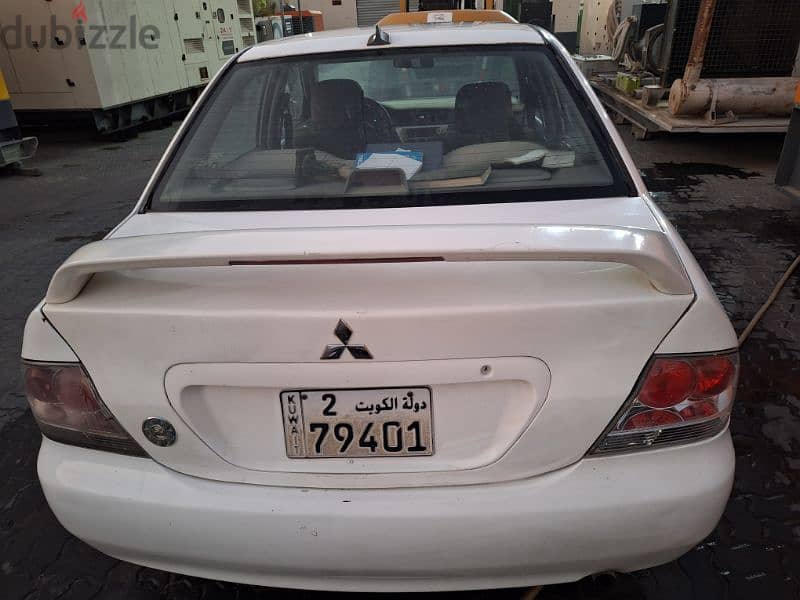 Mitsubishi Lancer 2004ميتسوبيشى لانسر 5