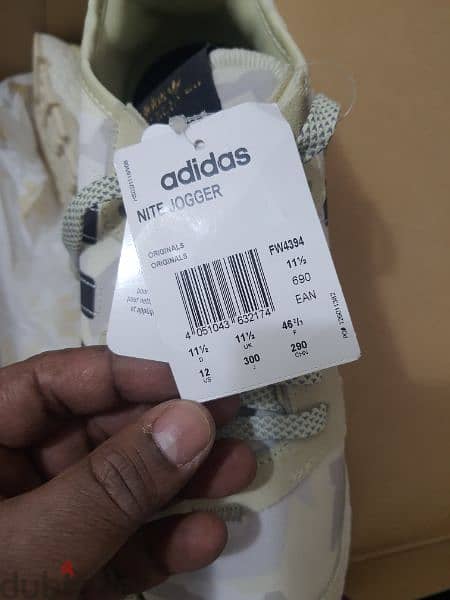 Original Adidas shose for sale size 46.5 new unused. 5