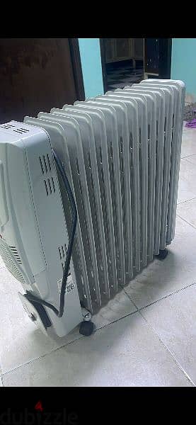 Midea 11 fins heavy oil heater less used like new 1