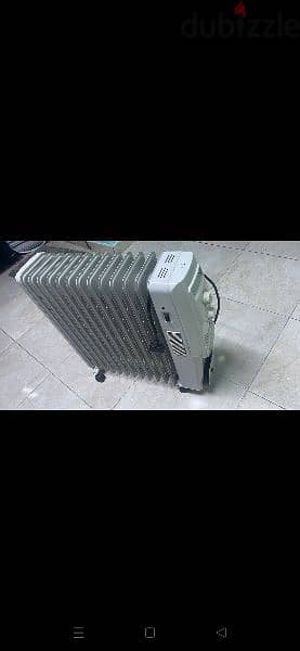 Midea 11 fins heavy oil heater less used like new 2