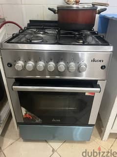 Cooking range with four burner an automatic ignition 0