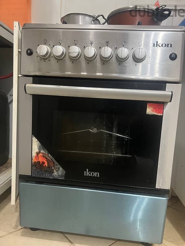 Cooking range with four burner an automatic ignition 2