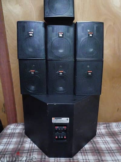 jbl subwoofer and 7 satellite speakers